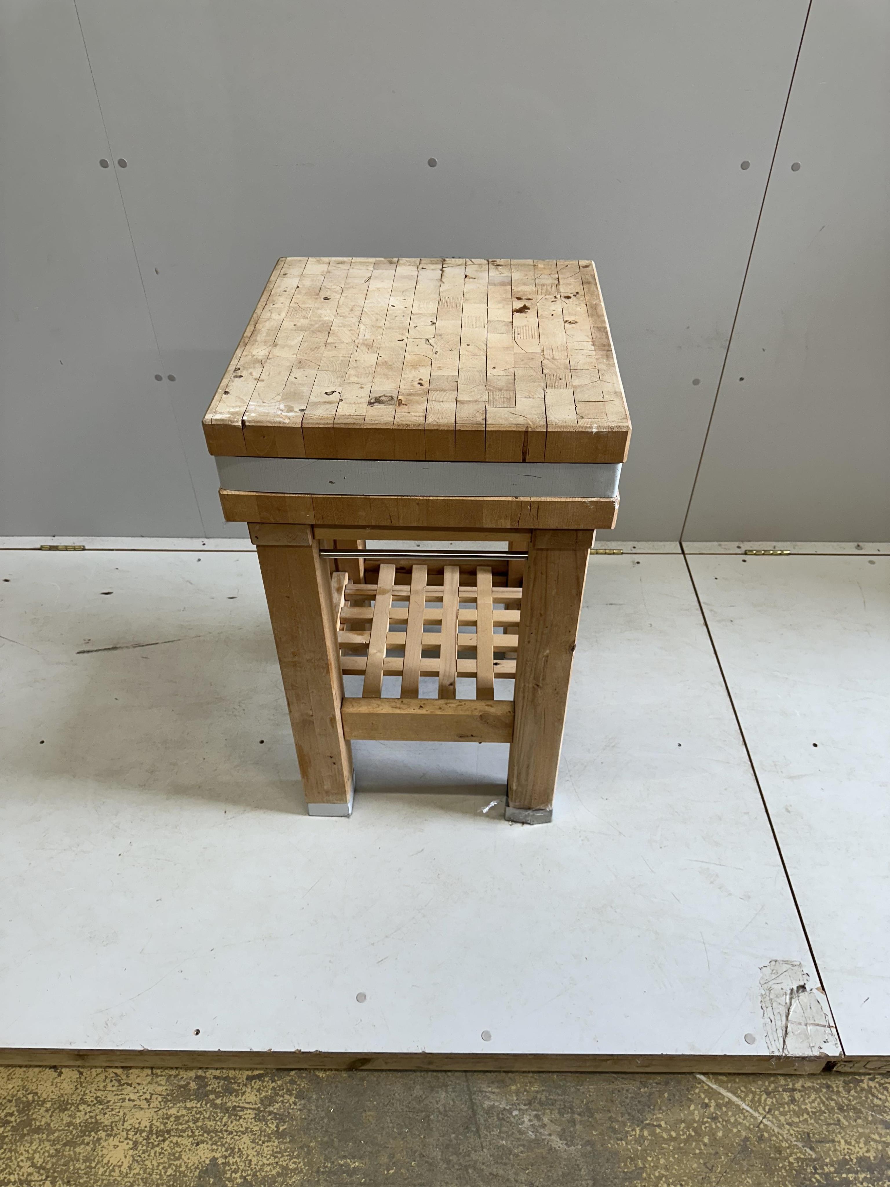 A modern beech two tier butcher's block, width 49cm, depth 49cm, height 84cm. Condition - fair